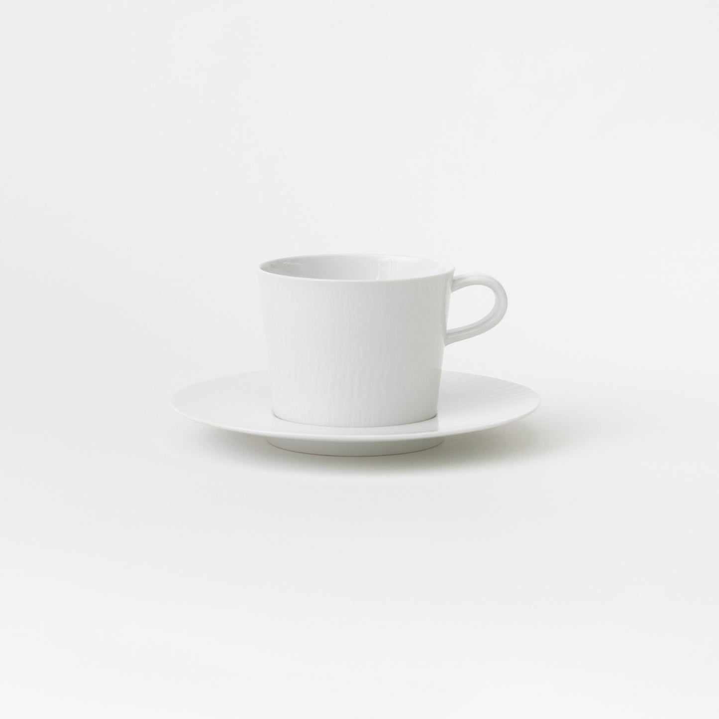 Carved Coffee Cup & Saucer