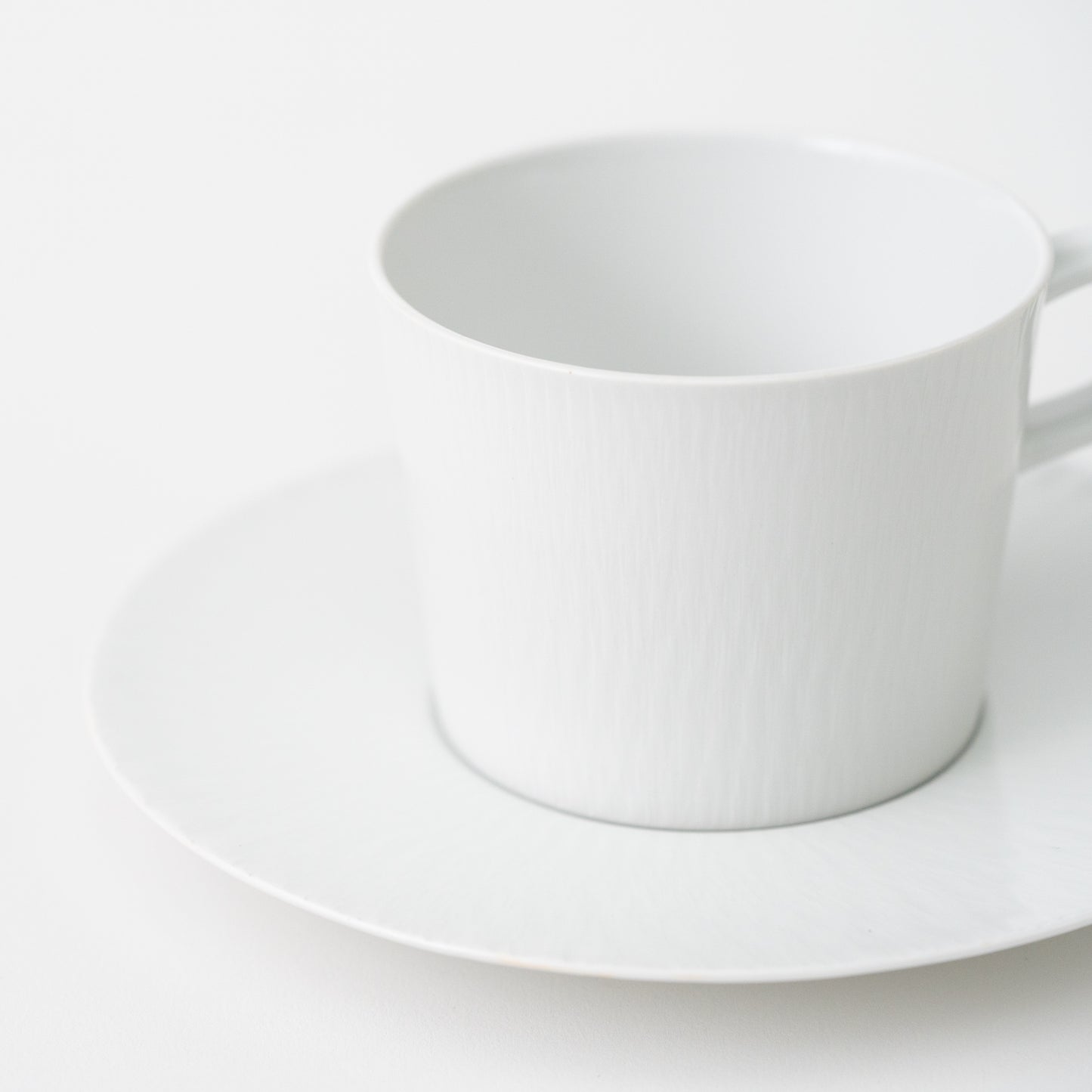 Carved Coffee Cup & Saucer